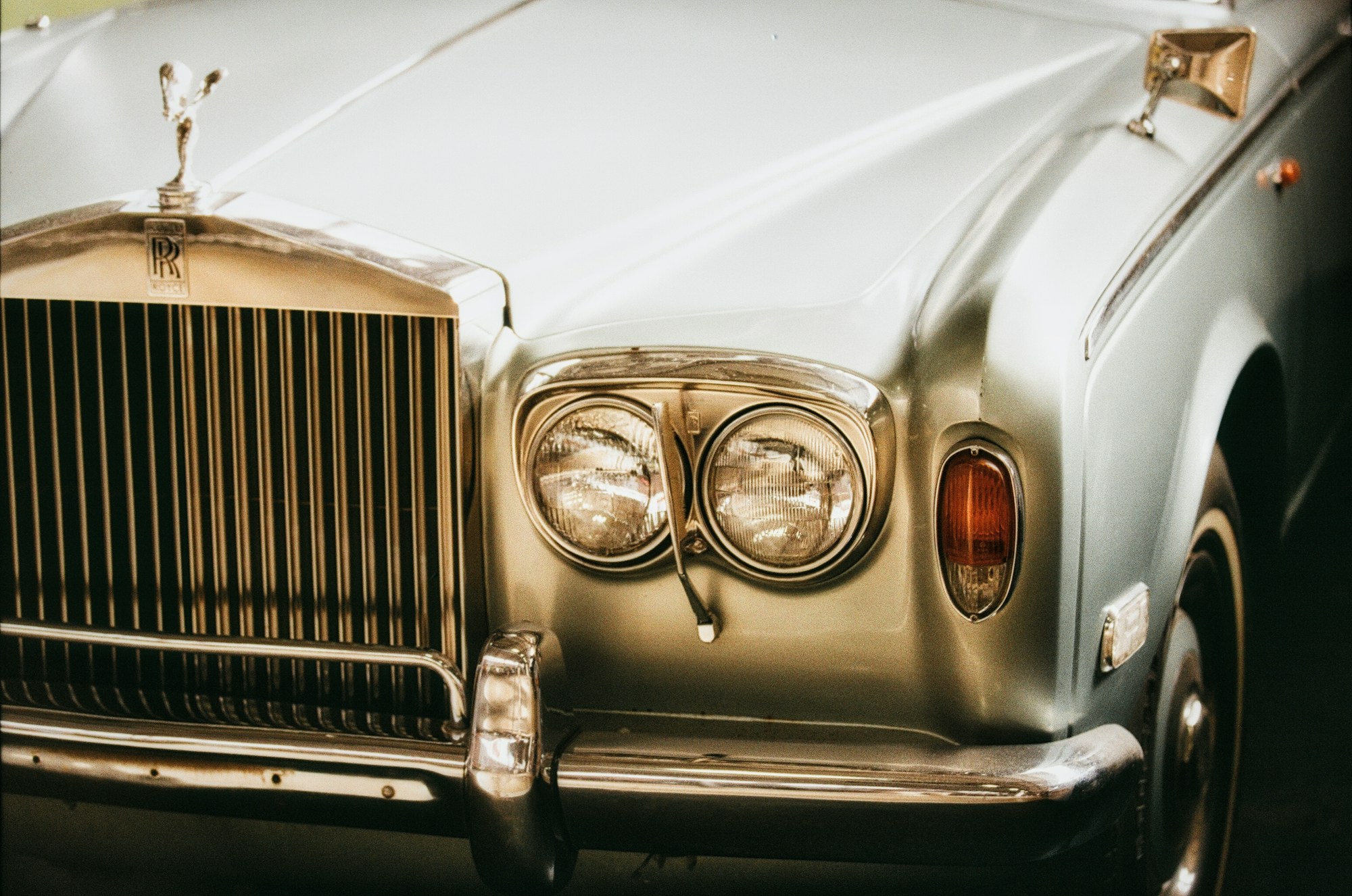 The Spirit of Ecstasy above a Rolls-Royce grille.